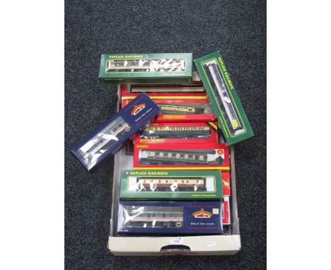 Eighteen OO Gauge Outline British Coaches by Hornby, Bachmann, Replica Railways and other, boxed.