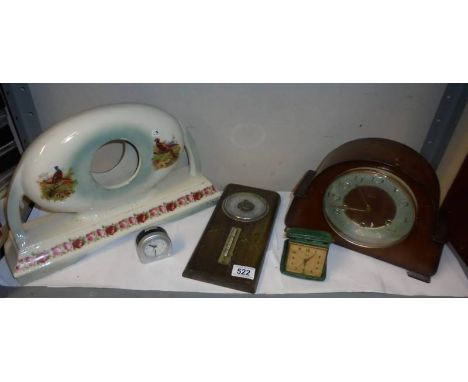 A ceramic clock case, a mantel clock, a barometer and two other clocks. COLLECT ONLY.