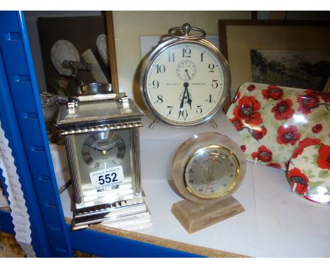 A carriage clock and two others.