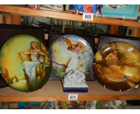 Three collector's plates and a trinket box.