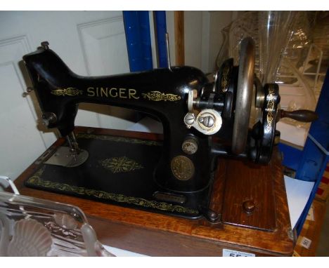 A Singer manual sewing machine, COLLECT ONLY.