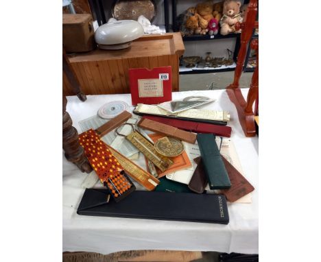 A good lot of measures, calculators, abacus, etc