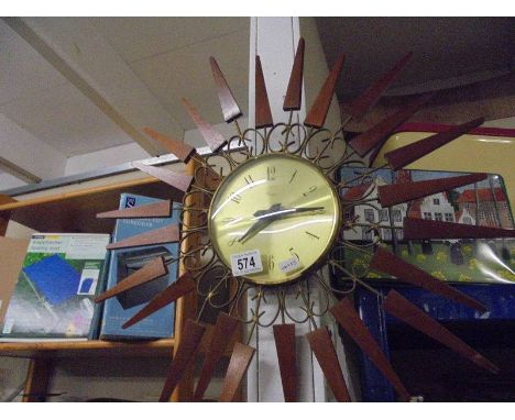 A vintage starburst clock. COLLECT ONLY.