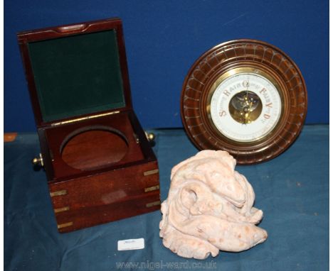 A circular barometer, a compass box (missing compass) and carved figure of fish