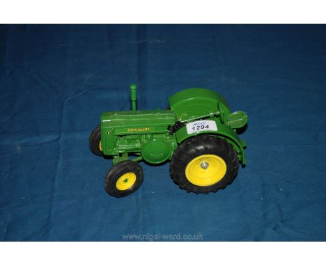 An Ertl model of a John Deere tractor