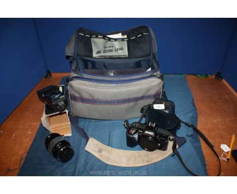 A case containing a Minolta 5000 auto focus Camera, Miranda MAF32 flash gun, a Sigma auto focus lens and a Sigma zoom lens