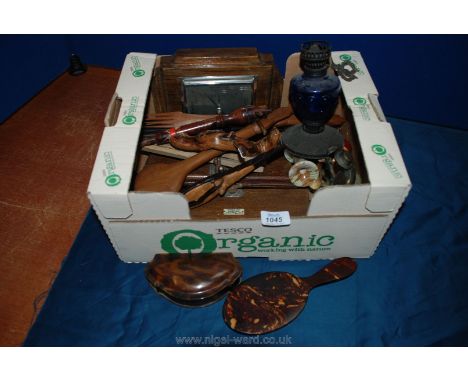 A quantity of miscellanea including tie presses, tortoiseshell effect dressing table items, butter pats, barometer, etc