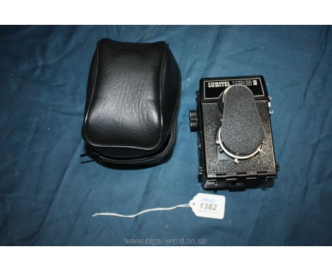 A Lubitel Nomo Russian Camera, case and handbook