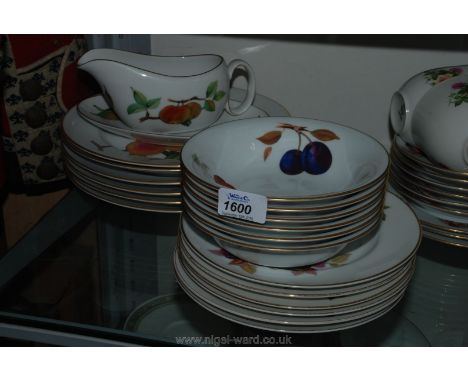 Six Royal Worcester 'Evesham' dinner plates, six dessert plates, six bowls and a gravy boat and stand
