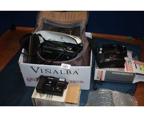 A Sanyo video recorder S1, Hanimex IC2000, Canon Snappy QT and a Miranda ME.X camera