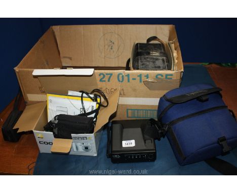 A box of cameras and accessories including a Nikon Coolpix 5200, a Quartz 5 cine camera, a Polaroid image camera, etc