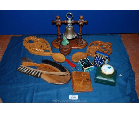 A quantity of miscellanea to include two Welsh love spoons, Post and paddock enamel Box with jockey on lid, mirror and two br