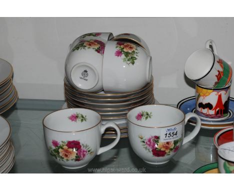 A Royal Worcester part Tea set including six cups and saucers and three tea plates