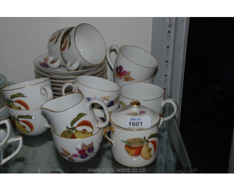 Ten Royal Worcester saucers, six tea cups and three larger cups, sugar bowl, milk jug and lidded sugar pot