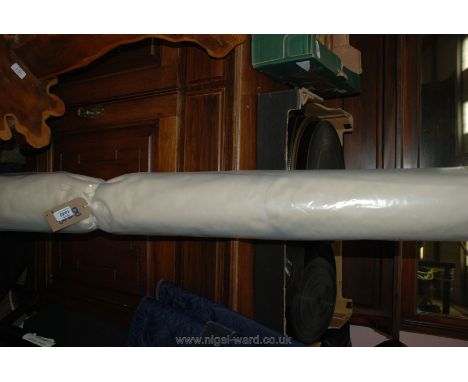 A roll of cream pattern Woodhey dye 54" wide material for curtains, etc; about 7 yards which includes a short length of about