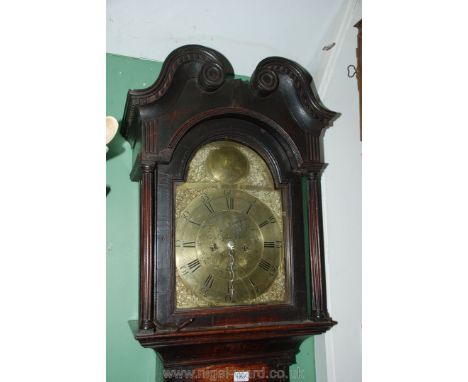 An Oak cased Longcase Clock having eight day movement with arched brass face with Roman numerals and Arabic numbers, having i