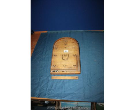 A small Bagatelle with balls