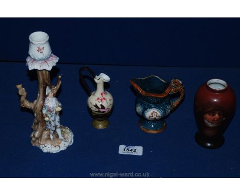 A Galluba & Hofamann fisherman vase and three German porcelain items including candlestick and small jugs