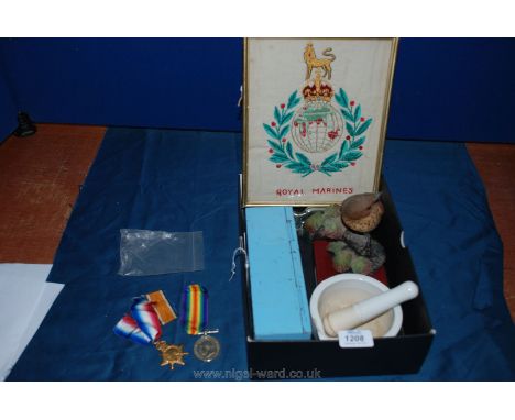 A box of miscellanea including pestle and mortar, ceramic sculpture of a song thrush, codd bottle, Royal Marines commemorativ
