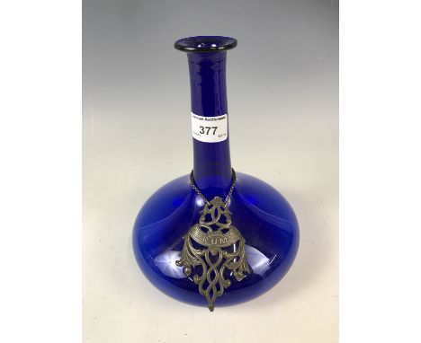 A Victorian blue glass mell decanter with electroplate bottle ticket
