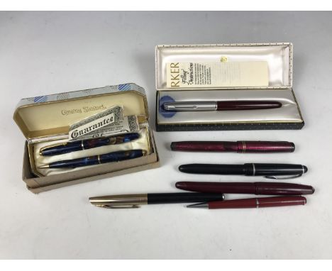 A 1930s lady's cased Conway-Stewart fountain pen and pencil set, together with Swan, Parker and other pens