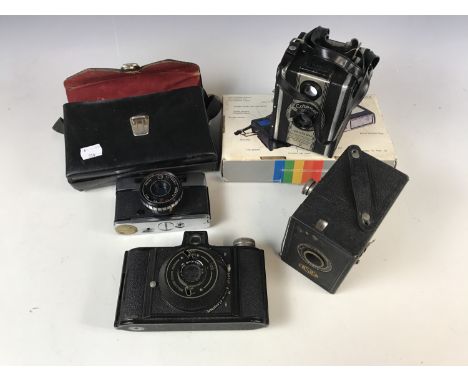 A Wembley sports camera together with a Prinz Saturn camera, an Ensign Twenty box camera and a Coronet twelve 20 etc