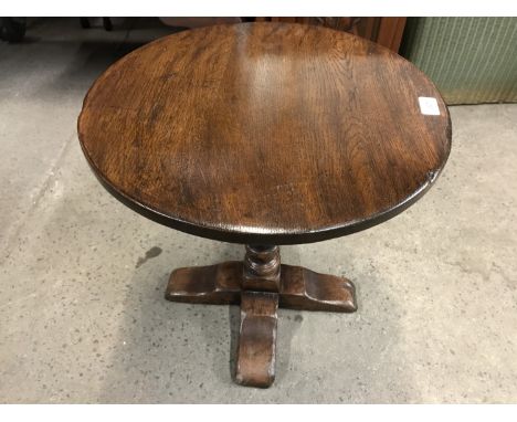 A reproduction oak lamp / wine table, 45 cm high