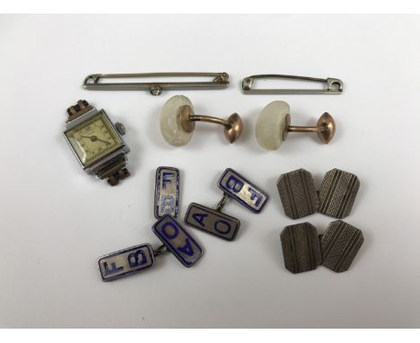 Sundry items of jewellery including a pair of enamelled white metal AOFB cuff links, a pair of engine-turned white metal cuff