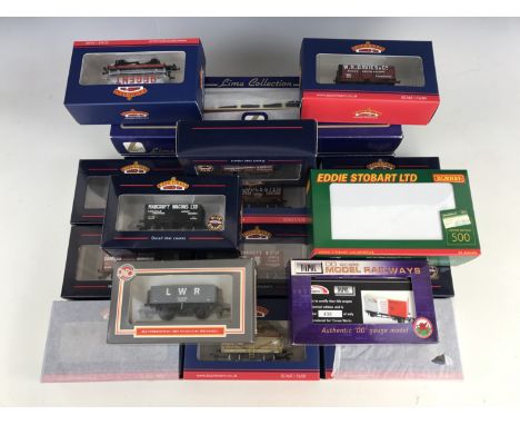 Fourteen boxed Bachmann rolling stock together with two boxed Lima carriages