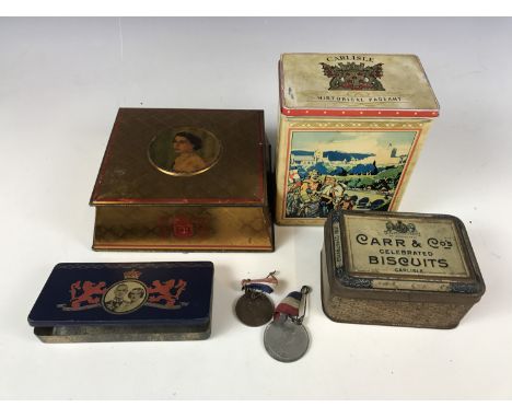 A quantity of vintage tins including a Carlisle historical pageant tea caddy and two coronation medals