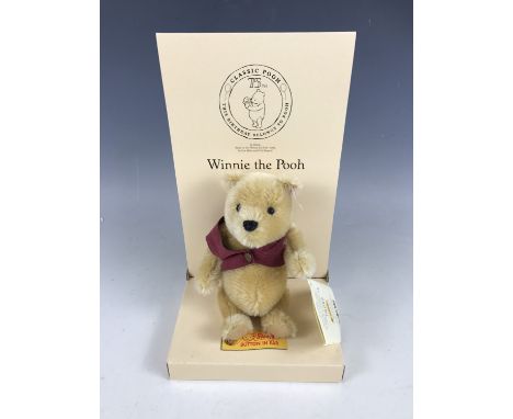 A boxed Steiff Winnie the Pooh