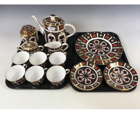 A Royal Crown Derby tea set together with a teapot and ginger jar (both a/f)