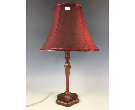 A red lacquered Chinoiserie table lamp with shade