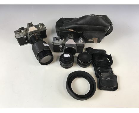 A Praktica MTL-3 camera together with a Praktica LTL 3 with Vivitar 80-200mm 1:4.5 mc zoom etc