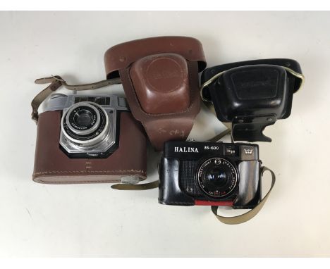 A Halina Achromat camera together with a Halina Anastigmat camera