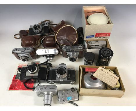 Sundry cameras and equipment including a boxed Halina Rolls camera with case, a Gafansco camera, a Praktica IV camera, a Koda
