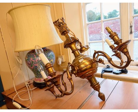 A pink ground Chinese style lamp, and a ceiling brass five branched light