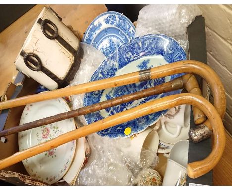 A box of assorted ceramics including pearl ware, Chinese export dish and assorted commemoratives, and three walking canes