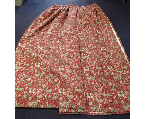 A PAIR OF TAPESTRY STYLE CURTAINS depicting animals and birds, lined, 180cm wide by 220cm deep
