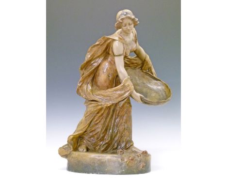 Goldscheider terracotta figure depicting a classical maiden holding a large bowl before her, after Perigot, 63cm high  Condit