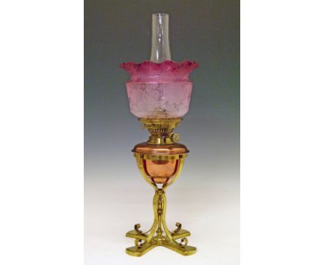 Late 19th/early 20th Century oil lamp having a removable copper reservoir, Hink's No.2 Duplex burner, wrought brass base and 