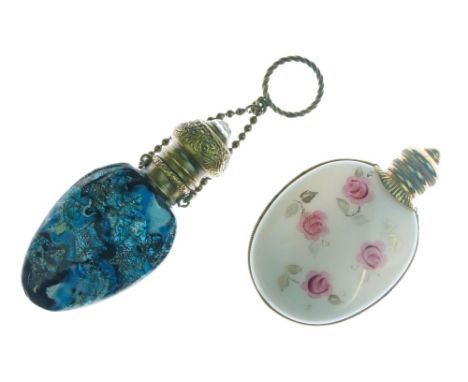 Two late 19th/early 20th Century Venetian glass scent bottles, one having blue, white and black mottled decoration, the other