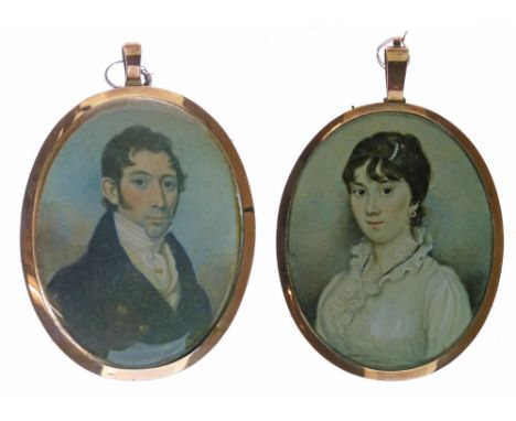 19th Century English School - Pair of oval miniatures - Portraits of a lady and gentleman, each in a gilt metal pendant frame