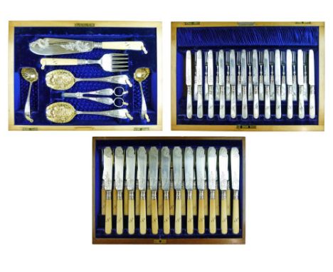 Edward VII silver fruit and fish set comprising: twelve mother-of-pearl handled fruit knives, eleven matching forks, pair of 