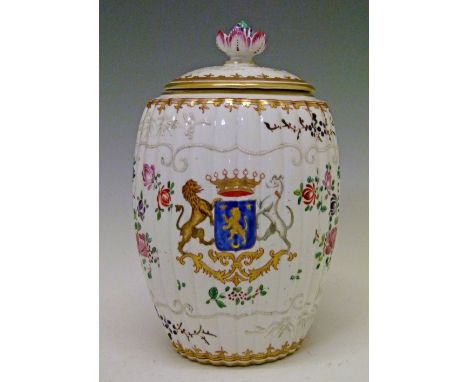 Samson porcelain barrel shaped jar and cover decorated in the Chinese Famille Rose armorial manner, 21cm high  Condition: The