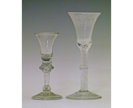 18th Century style wine glass, the bell bowl with engraved grapevine decoration, air twist stem and standing on a circular fo