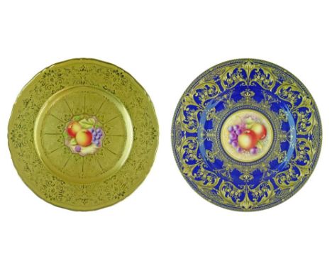 Two Royal Worcester cabinet plates, the first having central painted fruit decoration within a heavily gilded cobalt blue sur