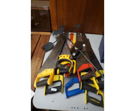Collection of hand saws, tools &amp; a weather vane 