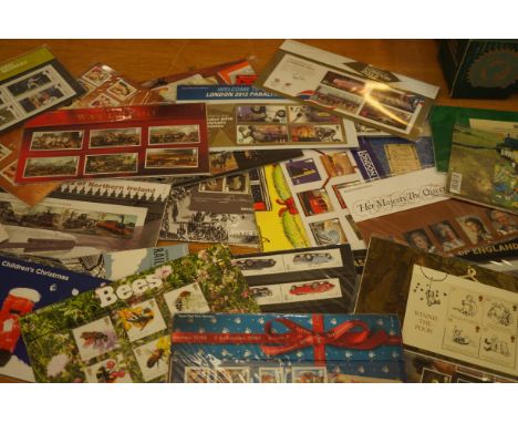 Large collection of mint presentation packs - many first class