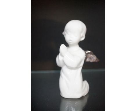 Lladro cherub with bisque head 